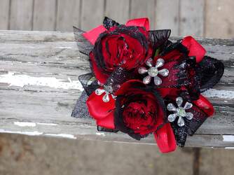 Red and Black wristlet from Rose Garden Florist in Barnegat, NJ